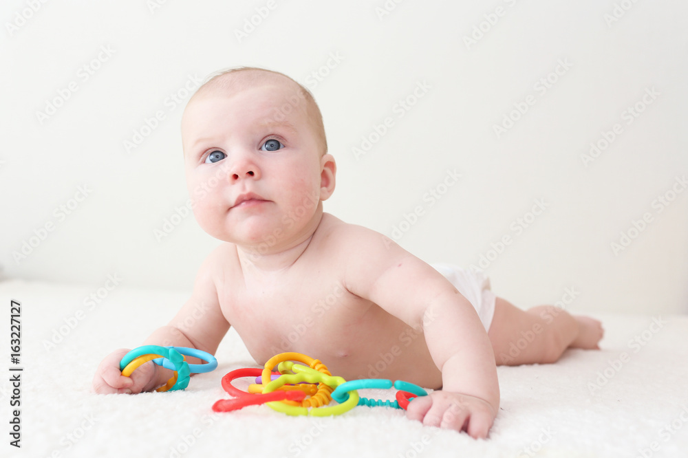 4 months baby girl plays educational toy teether at home 4 months baby girl plays educational toy teether at home