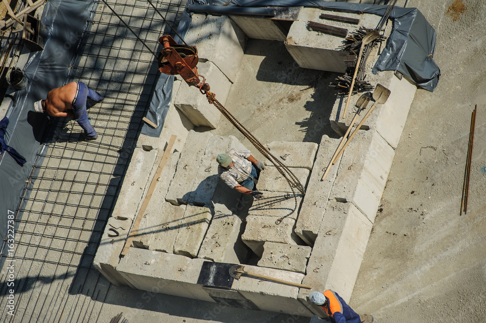 Construction worker working hard on a construction site.