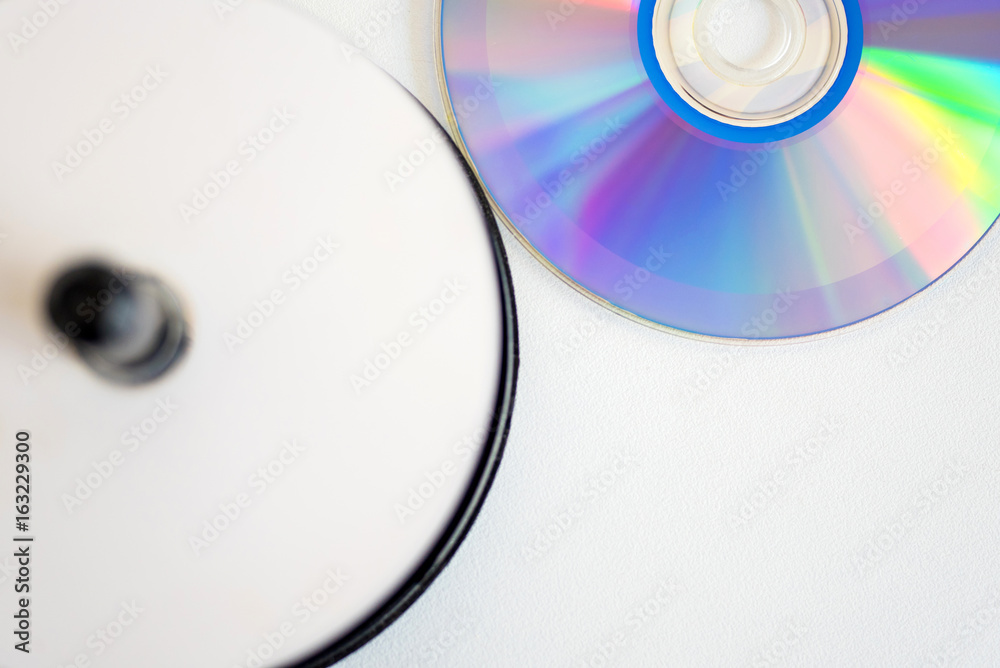 CD or DVD Compact Disc on A White table. CD or DVD Compact Disc on A White table.