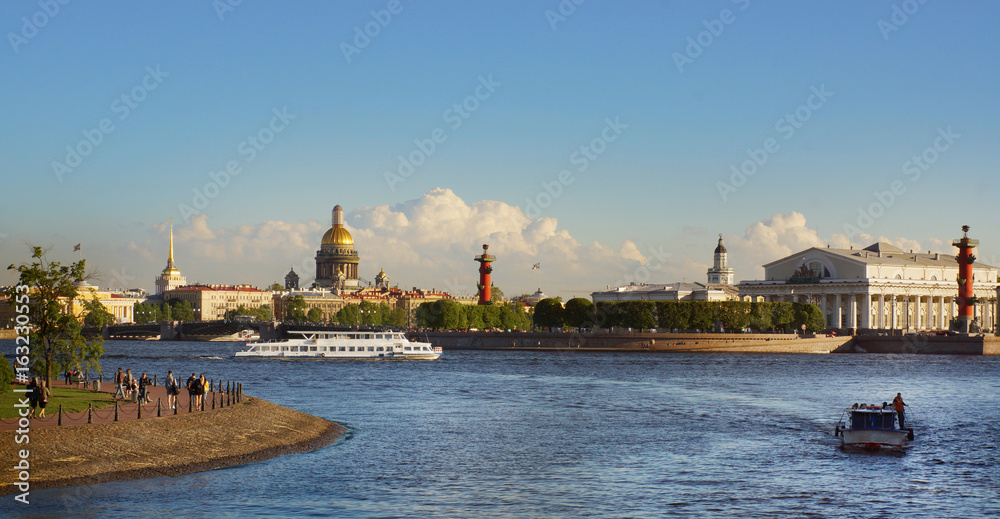 The horizontal landscape of St. Petersburg in summer, the main attractions of the city, the neva with boats