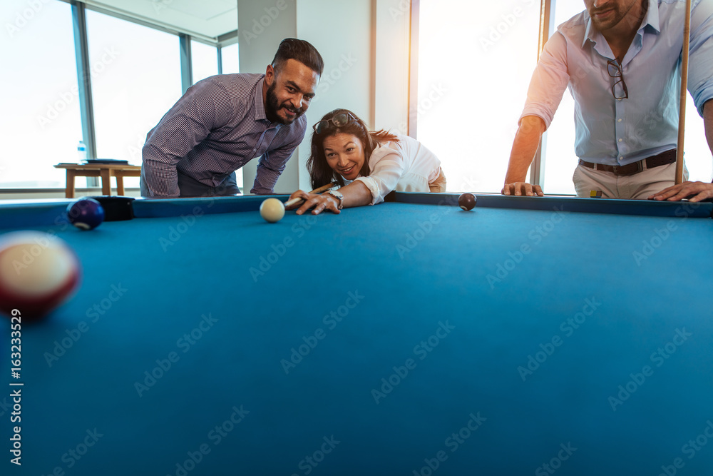 Business people spending leisure time after work. Business people spending leisure time after work.
