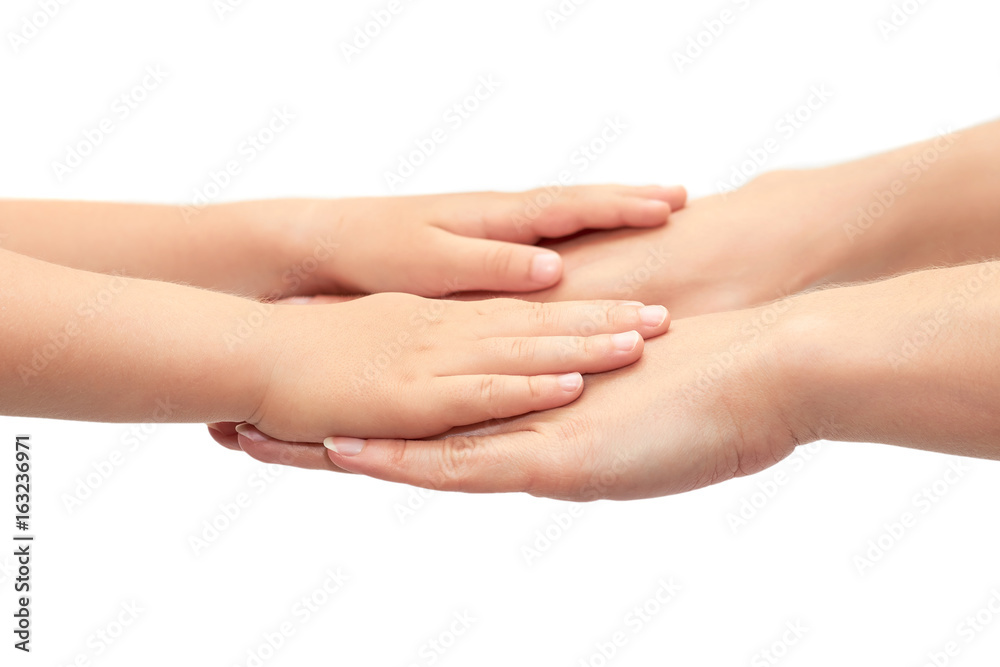 hand of young girl holding kids hand. Isolated on white background