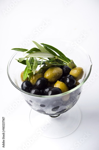 Mixed olives in the glass jar