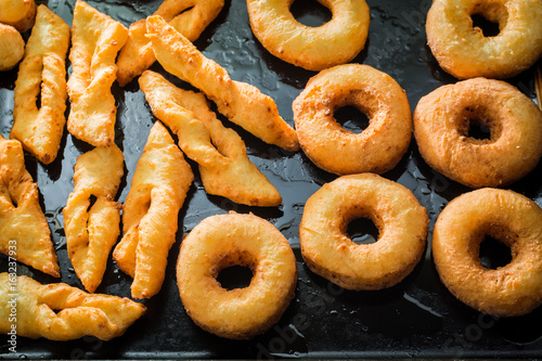 Sweet and hot golden donuts ready to eat