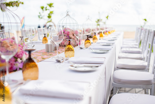 Table setting at a luxury wedding and Beautiful flowers on the table.