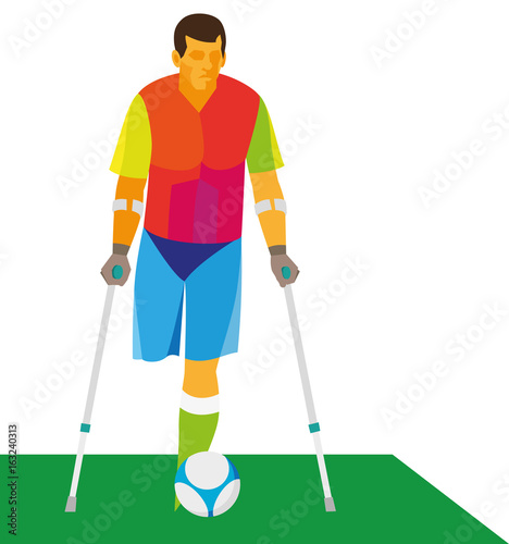 Athlete amputee on crutches is a football player