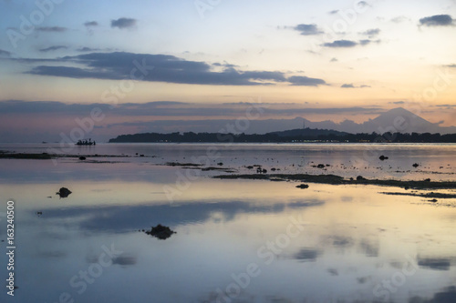 Boat in the ocean with view to Gili Meno from Gili Air  Lombok  Indonesia