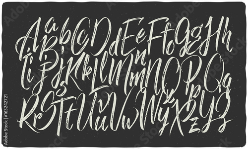 Hand drawn calligraphic font made with dry brush textured effect