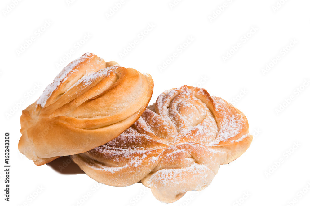 baked crusty rolls, top is dusted with sweet powdered sugar, white background, isolate, close-up baked crusty rolls, top is dusted with sweet powdered sugar, white background, isolate, close-up