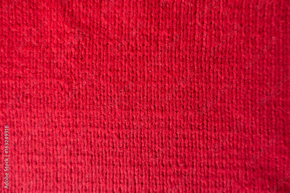 Close up of handmade crimson stockinet fabric