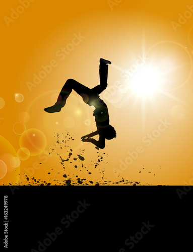 A Man Somersaulting On The Field 
