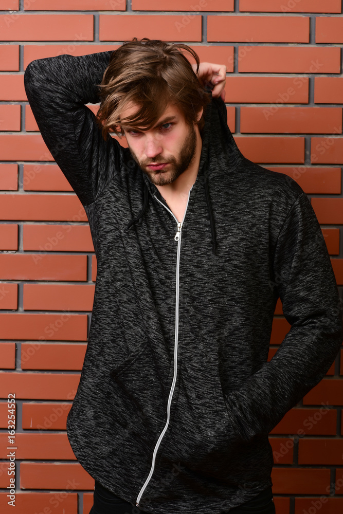 Bearded guy wearing sports outfit with scattered and sleepy face Bearded guy wearing sports outfit with scattered and sleepy face