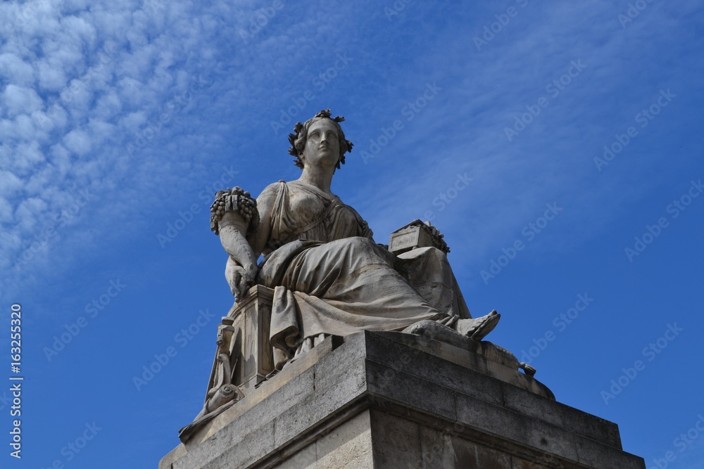The Statue of Abundance (1846) from Paris,  at Carousel Bridge, classical representation of the Roman goddess Abundantia holding a horn of plenty