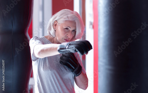 Close up of boxing elderly lady