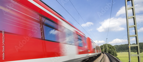 speed blurred passenger train outdoors