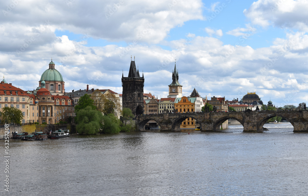 A view of Charles Bridge and the city center in Prague in Czech Republic. A view of Charles Bridge and the city center in Prague in Czech Republic.