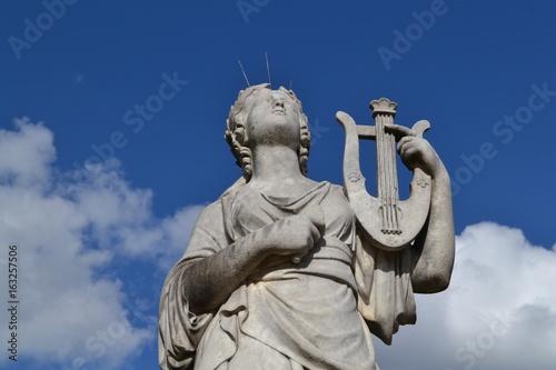 Inspirational statue in Paris, in Luxembourg Garden, representing Calliope, the muse, from Greek mythology photo