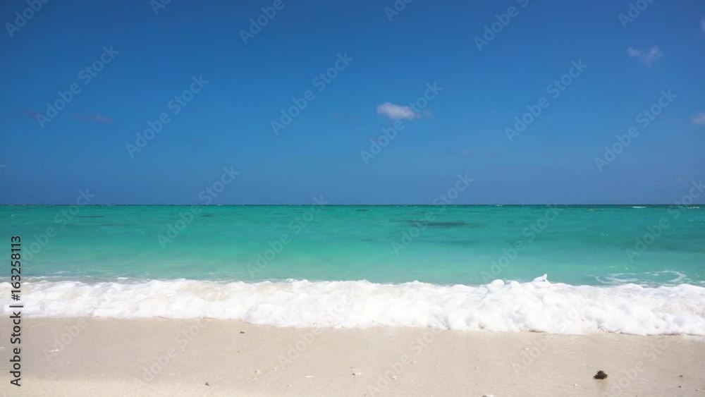 Beach, sea, sand,wave. Tropical beach, blue sky, clouds. Seascape ocean and beautiful beach paradise.Philippines 4K video Travel concept Beach, sea, sand,wave. Tropical beach, blue sky, clouds. Seascape ocean and beautiful beach paradise.Philippines 4K video Travel concept