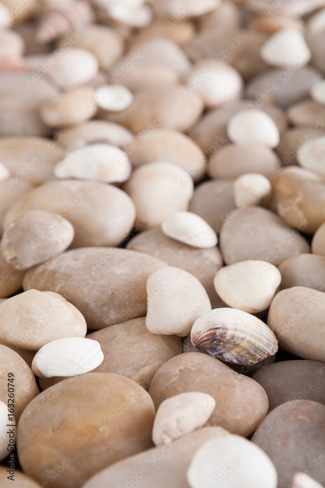 Sea pebbles background, natural seashore stones Sea pebbles background, natural seashore stones