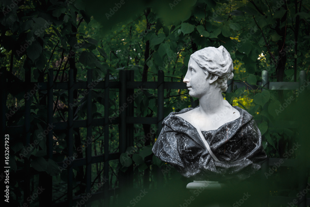 Sculpture of a girl looking to the side Sculpture of a girl looking to the side