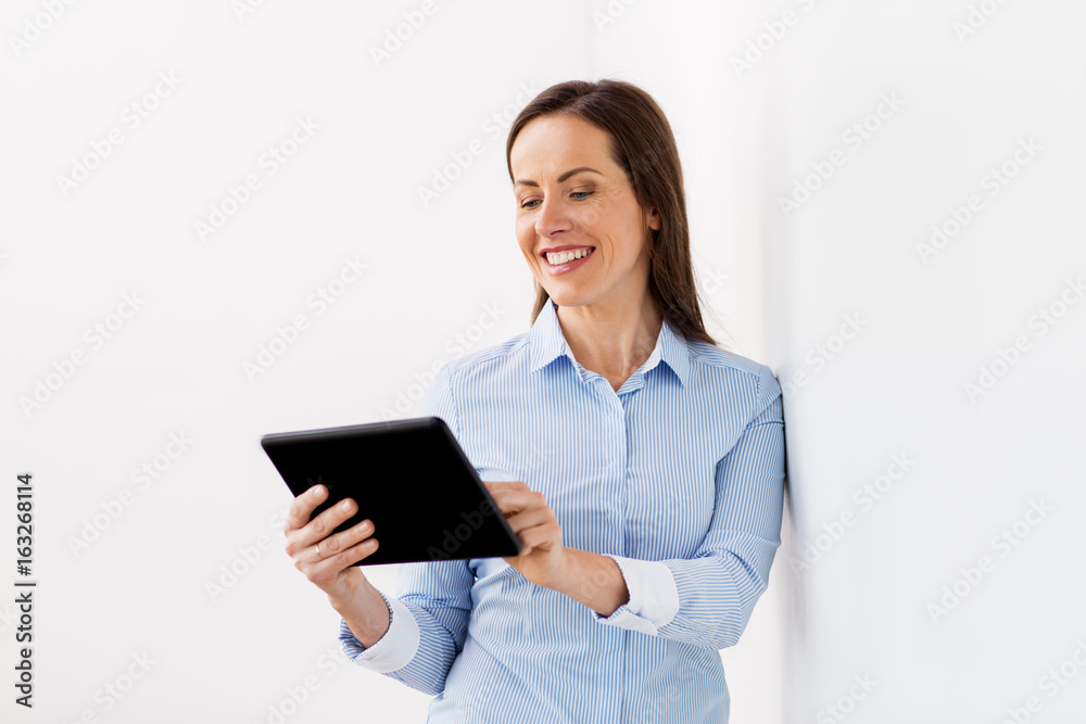 smiling businesswoman with tablet pc computer smiling businesswoman with tablet pc computer