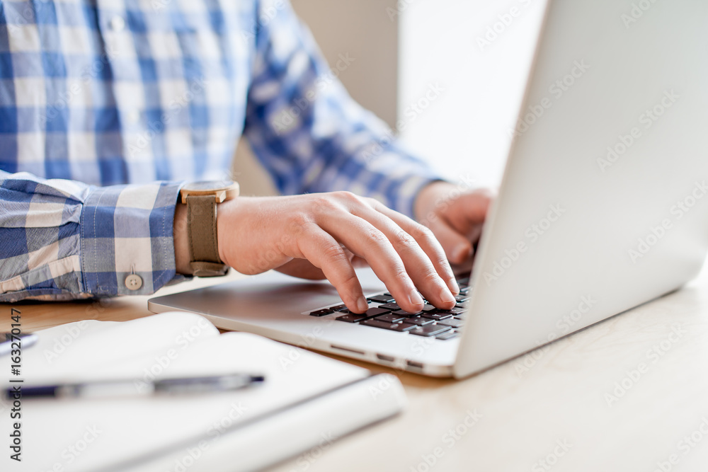 hands with laptop typing hands with laptop typing