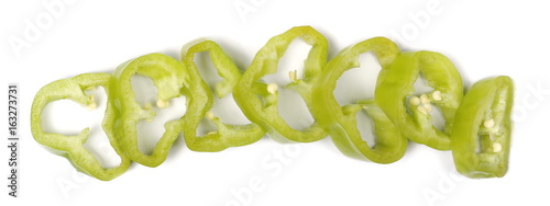 green pepper slices isolated on white background