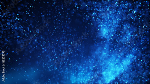 Lots of blue particles abstract background rendered with DOF and motion blur