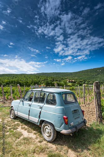 Old car in vineyard and plantation in Slovenia