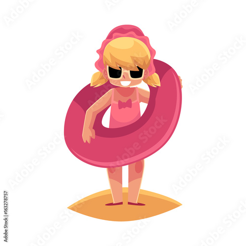 Happy little girl in swimming suit and sunglasses standing on sandy beach with inflatable ring, cartoon vector illustration isolated on white background. Little baby girl with inflatable ring on beach
