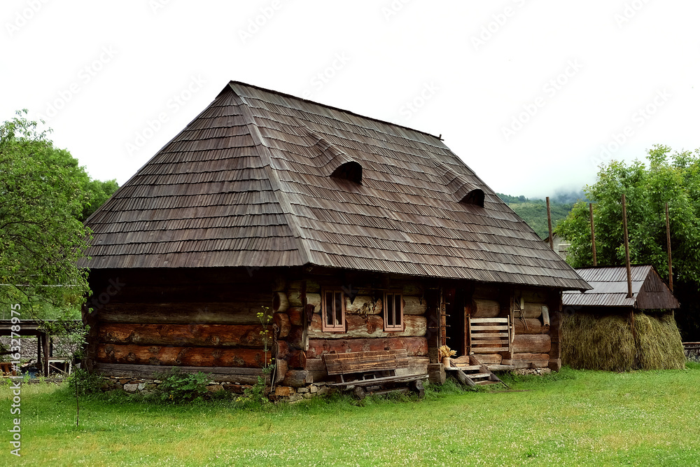 Fototapeta premium Old fashioned traditional Carpathian wooden house