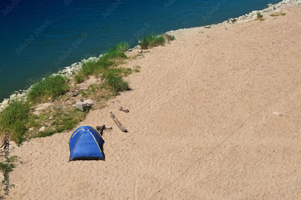 Lonely tent on the beach 2