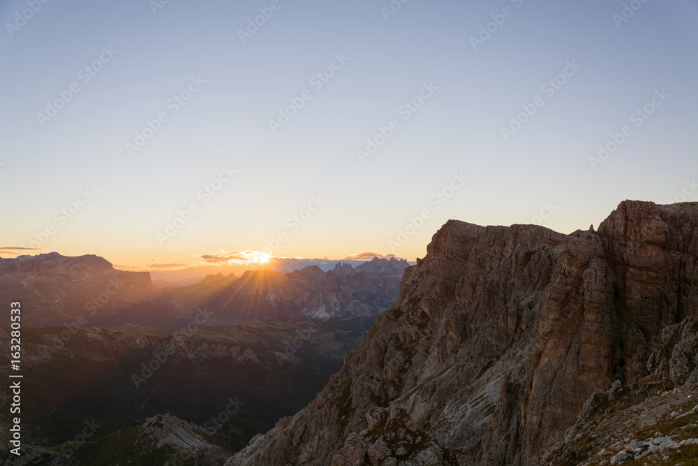Sunset over dolomite mountain peaks, Italy