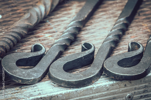 Steel rods on a table photo