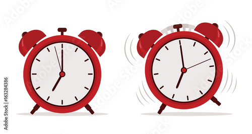 Alarm clock in flat style. Vector illustration. 
