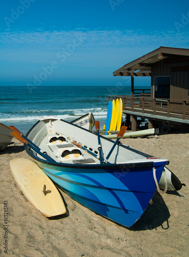 Colorful dory boats on California beach in San Clemente