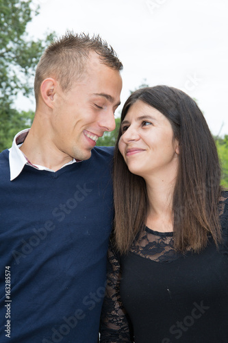 young couple in love having fun and enjoying the beautiful nature photo