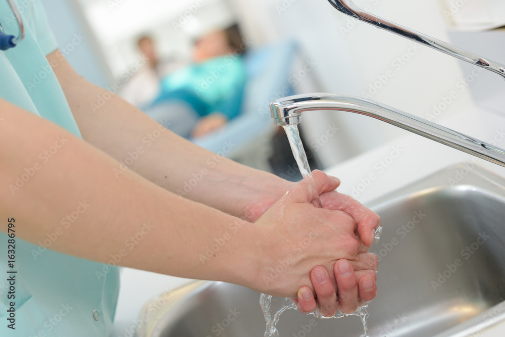Medical worker washing hands Medical worker washing hands