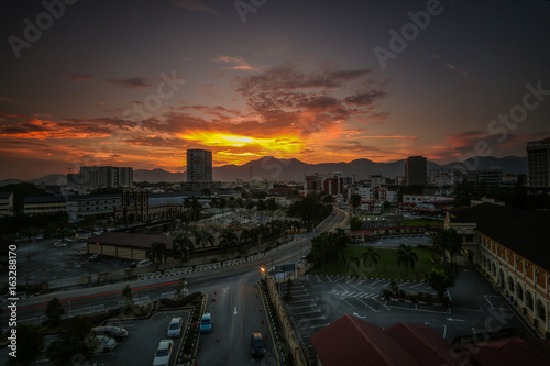 scenery of sunset with light trail at Ipoh Perak. motion blur soft focus due to long exposure