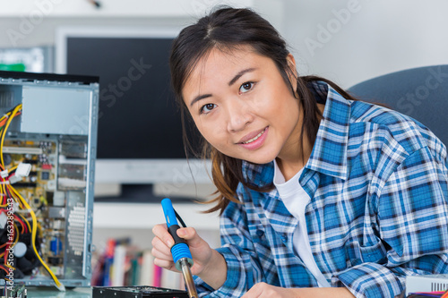 Oriental lady working on computer