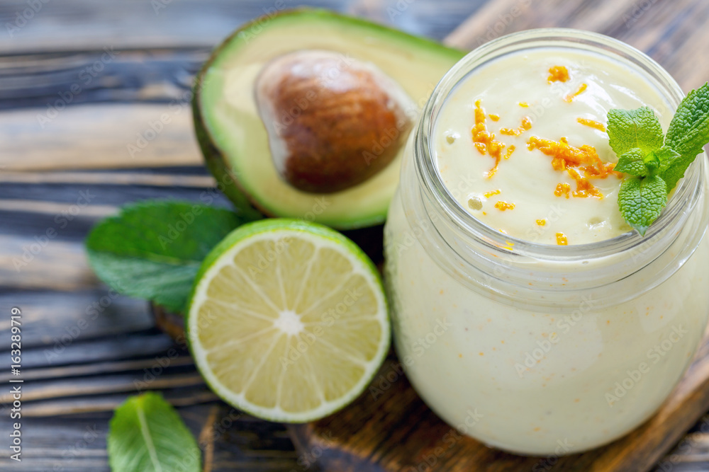 Jar with a smoothie of avocado, banana and yogurt. Jar with a smoothie of avocado, banana and yogurt.
