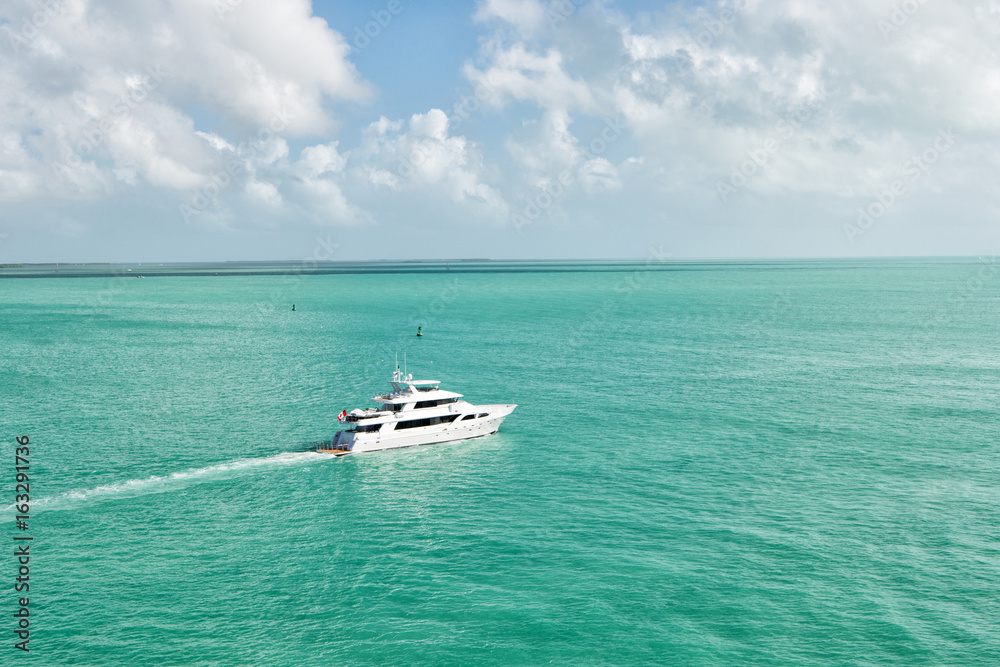 touristic yachts floating by green island at Key West, Florida touristic yachts floating by green island at Key West, Florida