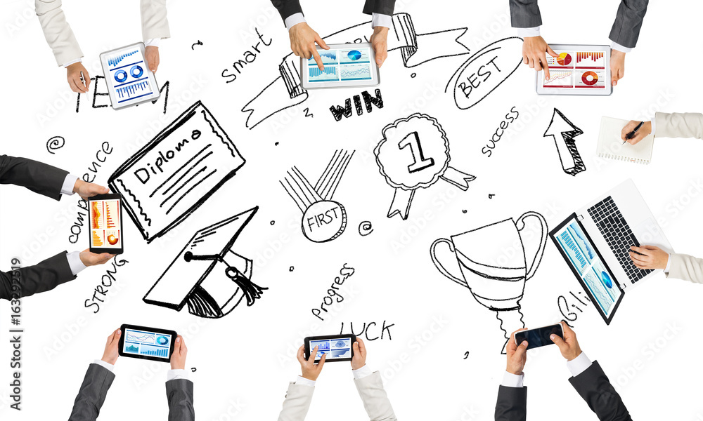 Top view of businesspeople sitting at table and using gadgets Top view of businesspeople sitting at table and using gadgets