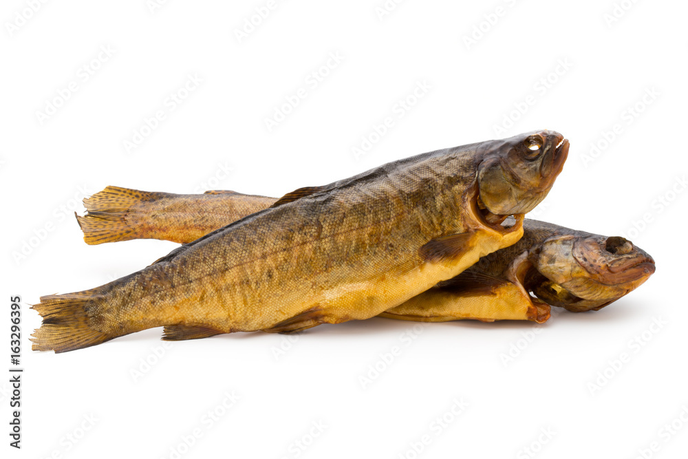 Smoked trout in front of a white background. Smoked trout in front of a white background.
