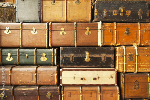 Obraz na plátne Old travel suitcases, abstract travel background