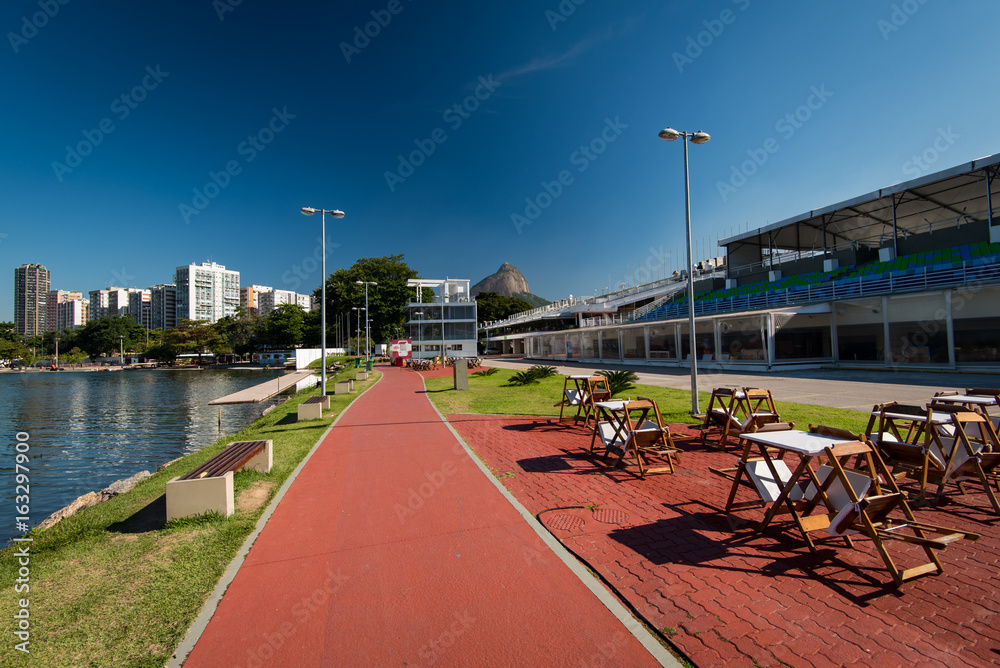 Bicycle Path Between Rodrigo de Freitas Lagoon and Outdoors Restaurant Tables