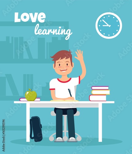 Schoolboy in classroom sitting at his desk and learning. Elementary school pupil raising hand. Vector illustration.