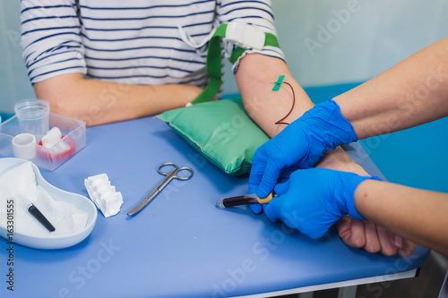 Procedure of blood capture from vein in hospital