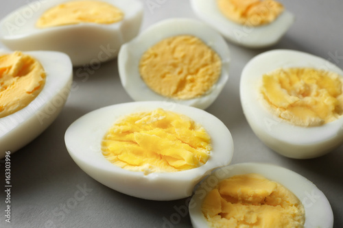 Sliced hard boiled eggs, closeup. Nutrition concept