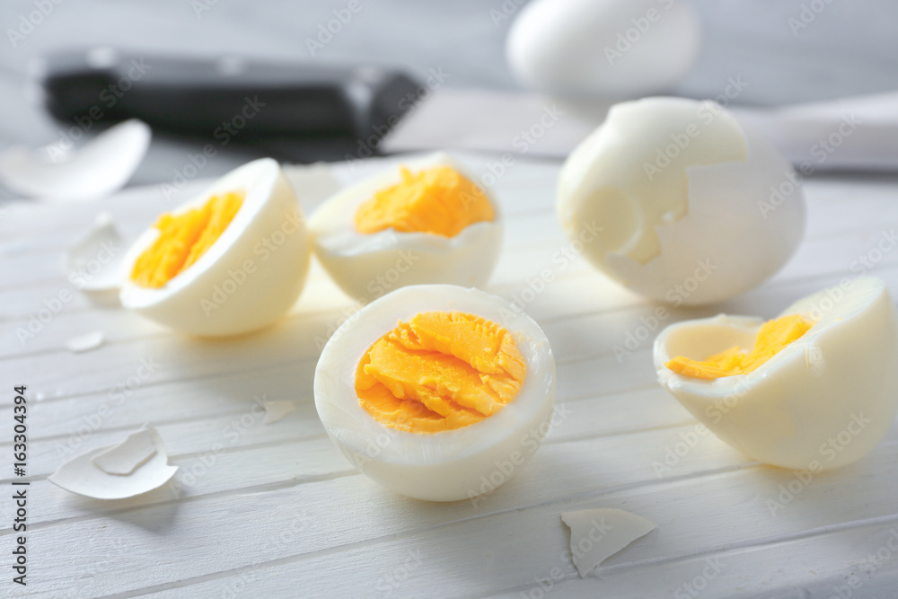 Cutting board with hard boiled eggs, closeup. Nutrition concept Cutting board with hard boiled eggs, closeup. Nutrition concept